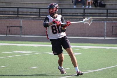 Senior competes in lacrosse game